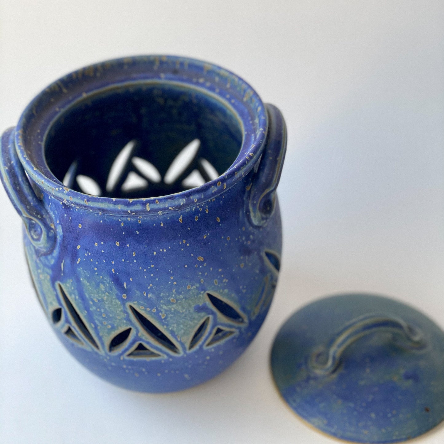 Jar with carvings